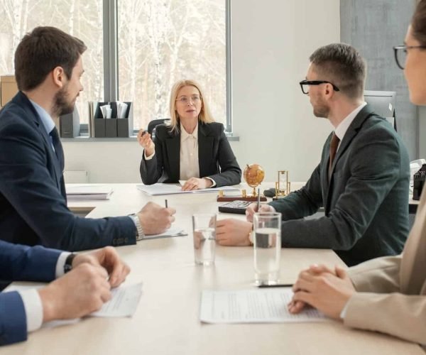 partners-of-law-firm-discussing-agenda-e1666447535340.jpg